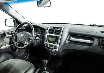 Подержанный автомобиль Kia Sportage 2009 года (9 фото)