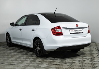 Подержанный автомобиль Skoda Rapid Liftback 2014 года (7 фото)