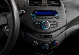 Подержанный автомобиль Chevrolet Spark 2013 года (15 фото)