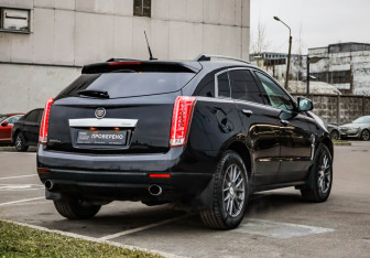 Подержанный автомобиль Cadillac SRX 2012 года (7 фото)