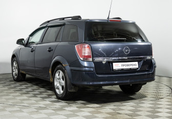 Подержанный автомобиль Opel Astra Wagon 2010 года (7 фото)