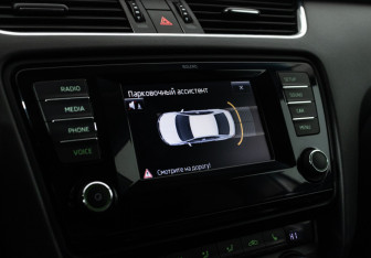 Подержанный автомобиль Skoda Octavia Liftback 2013 года (16 фото)