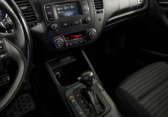 Подержанный автомобиль Kia Cerato Sedan 2014 года (19 фото)