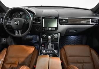 Подержанный автомобиль Volkswagen Touareg 2014 года (13 фото)