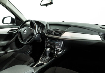 Подержанный автомобиль BMW X1 2014 года (9 фото)