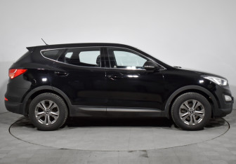 Подержанный автомобиль Hyundai Santa Fe 2015 года (4 фото)