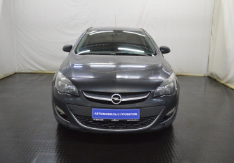 Подержанный автомобиль Opel Astra Sedan 2014 года (2 фото)
