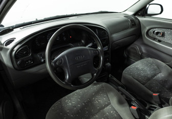 Подержанный автомобиль Kia Spectra Sedan 2008 года (11 фото)