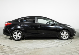 Подержанный автомобиль Kia Cerato Sedan 2013 года (4 фото)