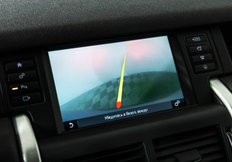 Подержанный автомобиль Land Rover Discovery Sport 2015 года (16 фото)