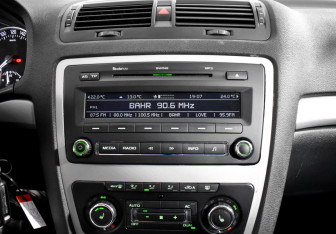 Подержанный автомобиль Skoda Octavia Liftback 2012 года (14 фото)