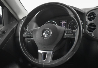 Подержанный автомобиль Volkswagen Tiguan 2013 года (14 фото)