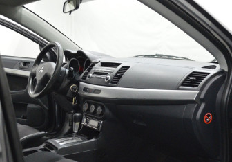 Подержанный автомобиль Mitsubishi Lancer Sedan 2008 года (10 фото)