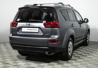 Подержанный автомобиль Peugeot 4007 2012 года (5 фото)