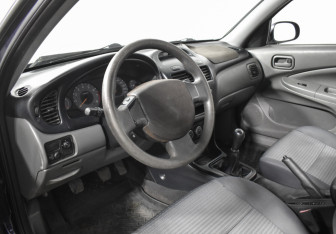 Подержанный автомобиль Nissan Almera Classic 2010 года (9 фото)