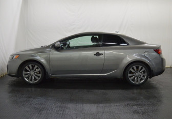 Подержанный автомобиль Kia Cerato Coupe 2010 года (8 фото)
