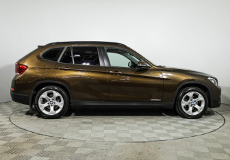 Подержанный автомобиль BMW X1 2014 года (4 фото)