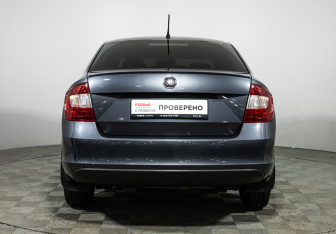 Подержанный автомобиль Skoda Rapid Liftback 2014 года (6 фото)