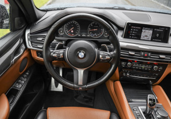 Подержанный автомобиль BMW X6 2018 года (15 фото)