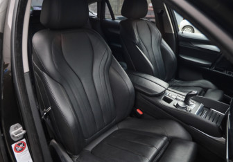 Подержанный автомобиль BMW X6 2015 года (23 фото)