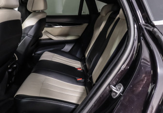 Подержанный автомобиль BMW X6 2016 года (20 фото)