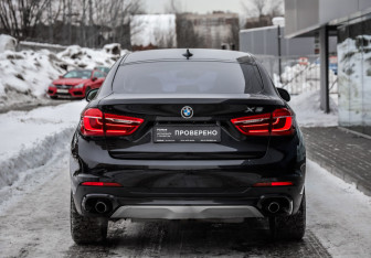 Подержанный автомобиль BMW X6 2016 года (7 фото)