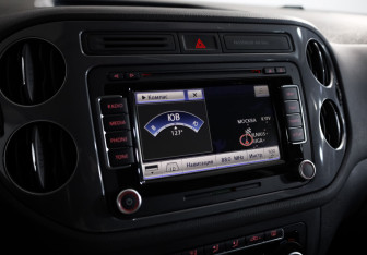 Подержанный автомобиль Volkswagen Tiguan 2013 года (13 фото)