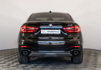 Подержанный автомобиль BMW X6 2015 года (6 фото)