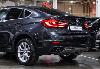 Подержанный автомобиль BMW X6 2016 года (13 фото)