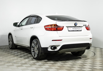 Подержанный автомобиль BMW X6 2013 года (7 фото)