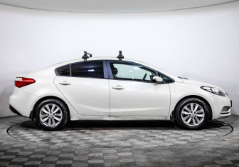 Подержанный автомобиль Kia Cerato Sedan 2014 года (4 фото)