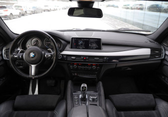 Подержанный автомобиль BMW X6 2017 года (10 фото)