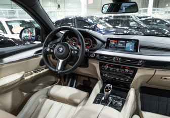 Подержанный автомобиль BMW X6 2018 года (14 фото)