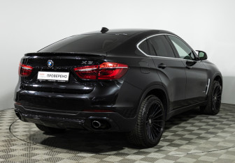 Подержанный автомобиль BMW X6 2015 года (5 фото)