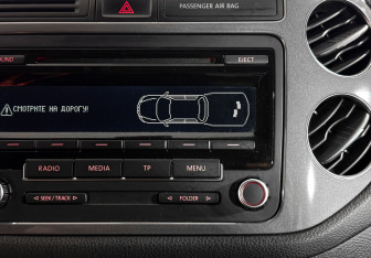 Подержанный автомобиль Volkswagen Tiguan 2013 года (19 фото)