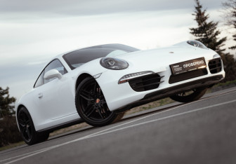 Подержанный автомобиль Porsche 911 Coupe 2013 года (13 фото)