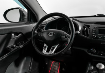 Подержанный автомобиль Kia Sportage 2011 года (15 фото)