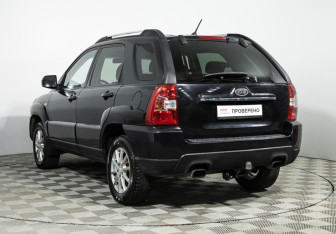 Подержанный автомобиль Kia Sportage 2010 года (7 фото)