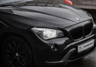 Подержанный автомобиль BMW X1 2013 года (11 фото)