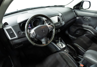 Подержанный автомобиль Peugeot 4007 2012 года (11 фото)