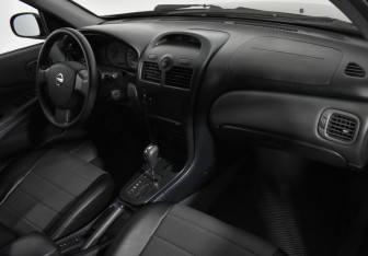 Подержанный автомобиль Nissan Almera Classic 2006 года (11 фото)