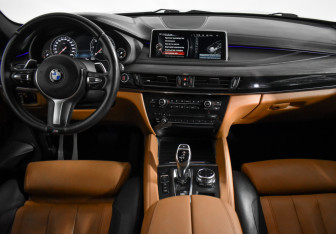 Подержанный автомобиль BMW X6 2014 года (16 фото)