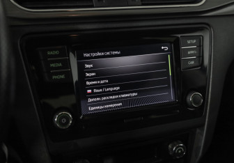 Подержанный автомобиль Skoda Rapid Liftback 2018 года (13 фото)