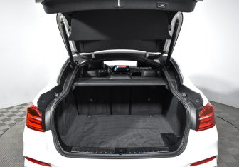 Подержанный автомобиль BMW X4 2015 года (21 фото)