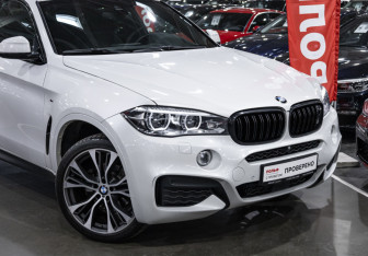 Подержанный автомобиль BMW X6 2016 года (7 фото)