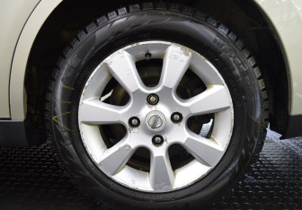 Подержанный автомобиль Nissan Tiida Sedan 2008 года (9 фото)