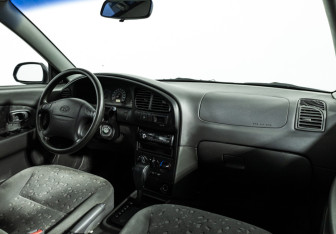 Подержанный автомобиль Kia Spectra Sedan 2008 года (9 фото)