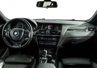 Подержанный автомобиль BMW X4 2015 года (13 фото)