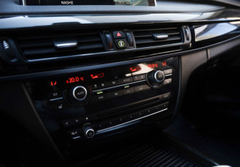 Подержанный автомобиль BMW X5 2014 года (14 фото)