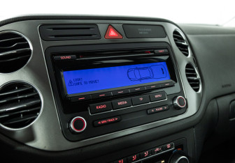 Подержанный автомобиль Volkswagen Tiguan 2011 года (15 фото)